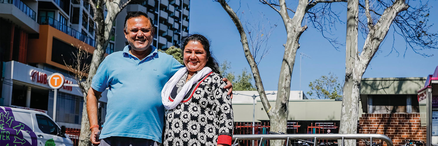 Mr and Mrs Neupane at Redfern Station in Redfern, Sydney CBD NSW. Credit: NSW Department of Planning and Environment / Salty Dingo