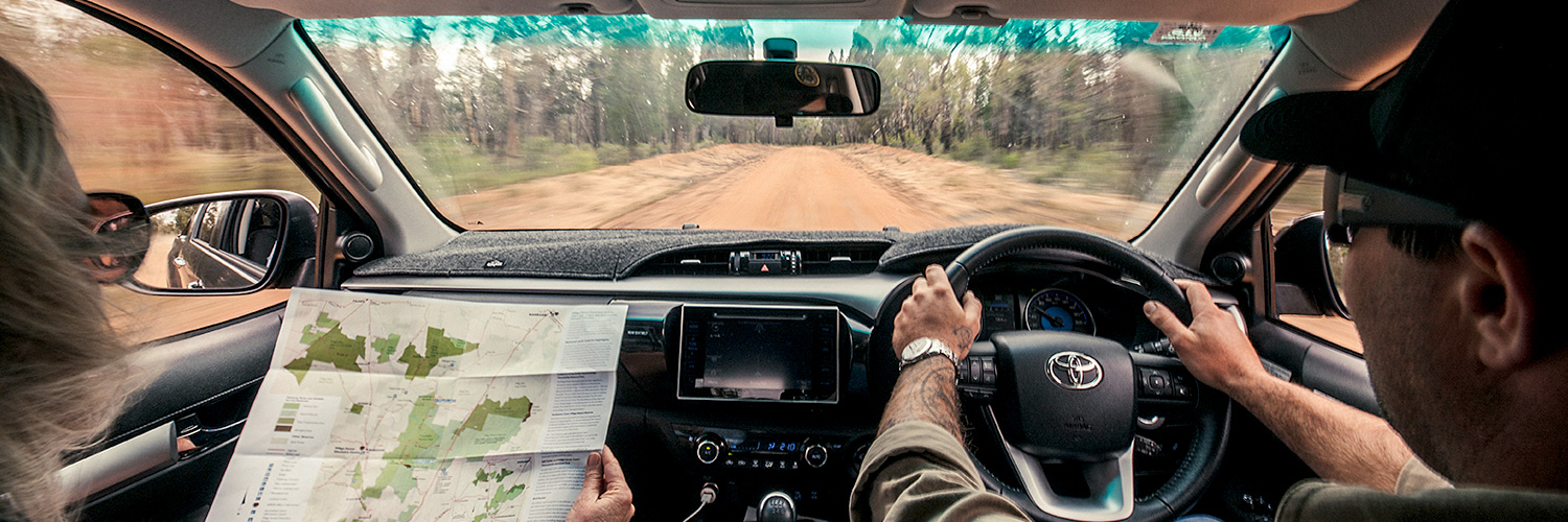 Couple travelling through the Pilliga Forest in a 4WD. Credit: Andrew Pearson