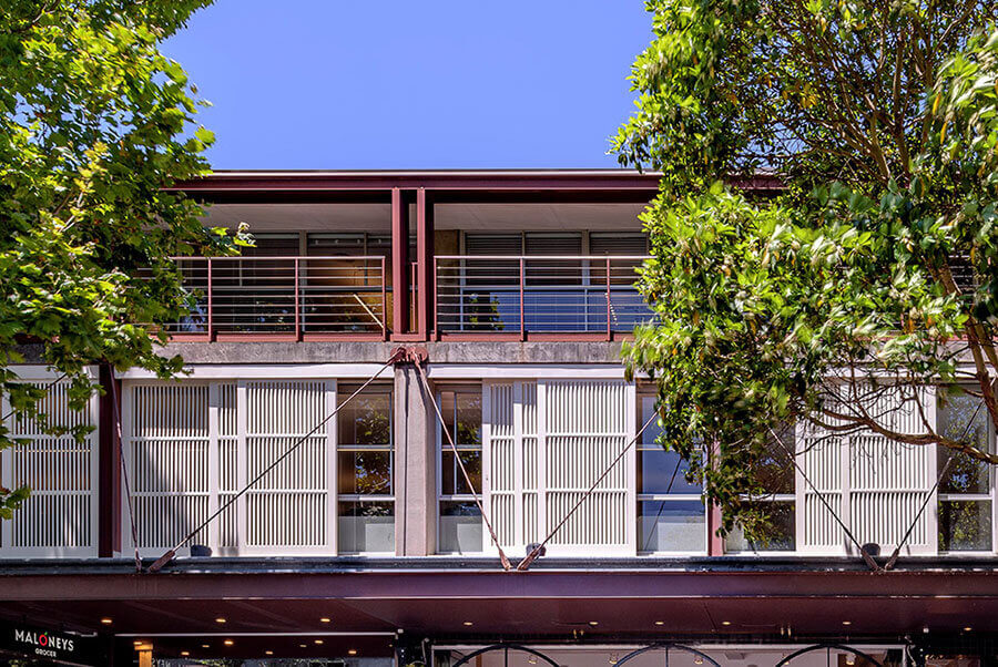 Better performance: Sliding shutters and deep overhanging roofs over top-floor verandahs provide shading and ventilation, allowing tenants to control heat gain. Credit: Ben Guthrie