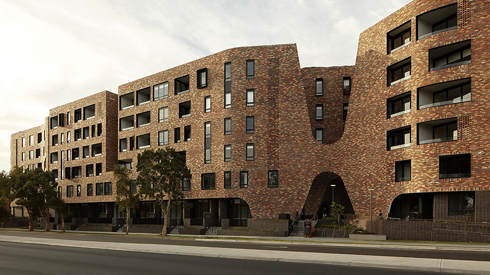 Arkadia is one of the largest recycled brick buildings in Australia and carefully integrated into the surrounding street. Credit: Tom Ross. Source: DKO.