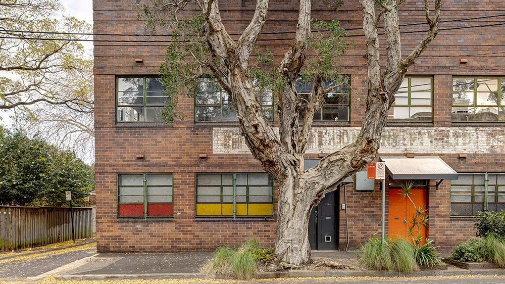 Adaptive re-use of a converted warehouse has created affordable housing that is in keeping with the character of the neighbourhood. Credit: Brett Boardman. Source: Marra + Yeh Architects