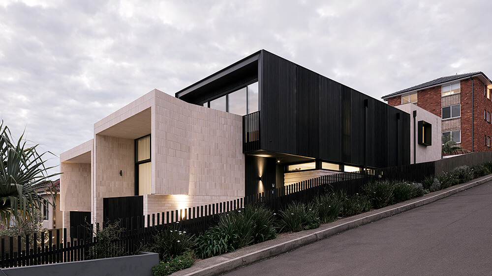 The 2 boutique homes are mirror images of each other and use materials that reflect the coastal location in Bondi. Credit: Tom Ferguson. Source: MHNDU