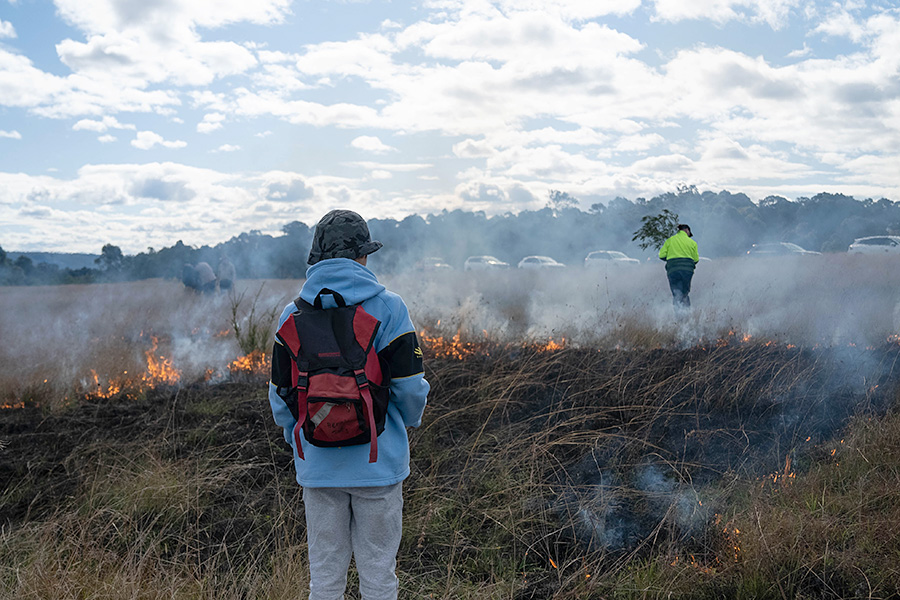 Cultural Burn at Caring for Country working group. Credit: NSW Department of Planning, Housing and Infrastructure