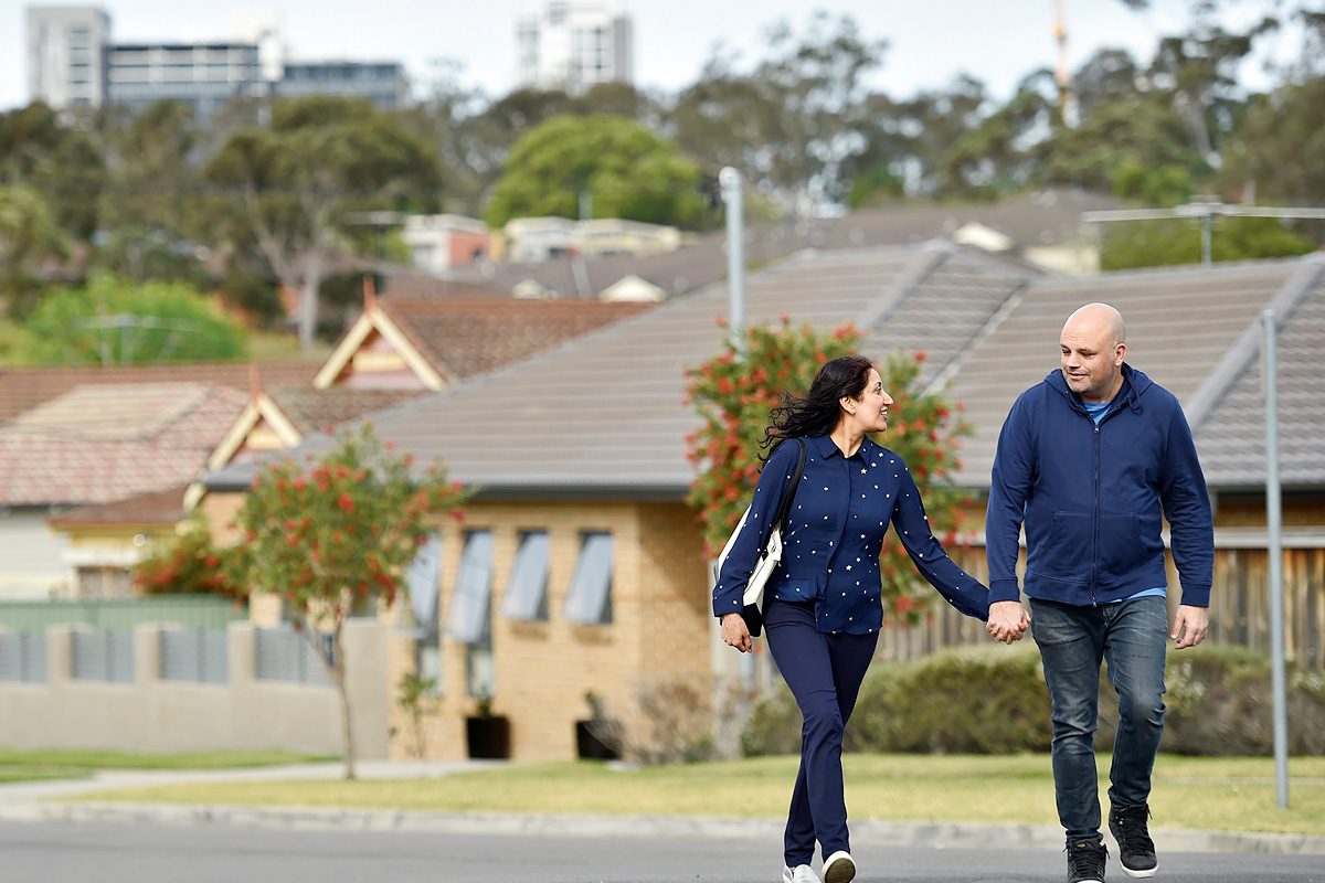 Couple walking in a residential area in Westmead, Western Sydney NSW. Credit: NSW Department of Planning and Environment / Adam Hollingworth