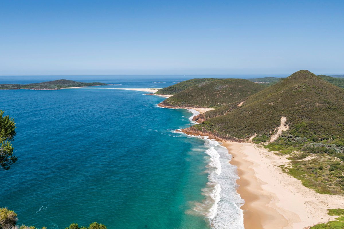 Looking south from Tomaree Headland onto Fingal Spit and Shark Island. Shoal Bay, NSW. Credit: NSW Department of Planning and Environment / Jaime Plaza Van Roon