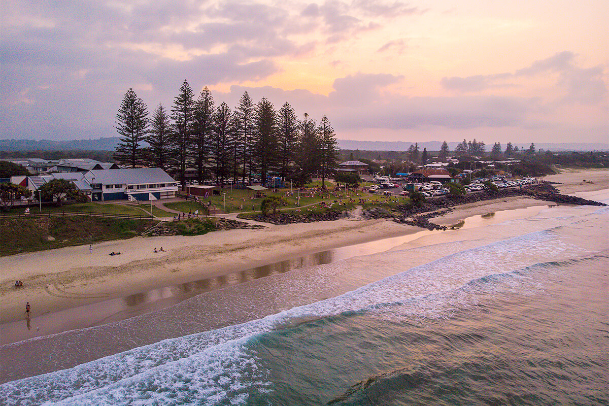 Sun setting over Main Beach, Byron Bay. Credit: Destination NSW