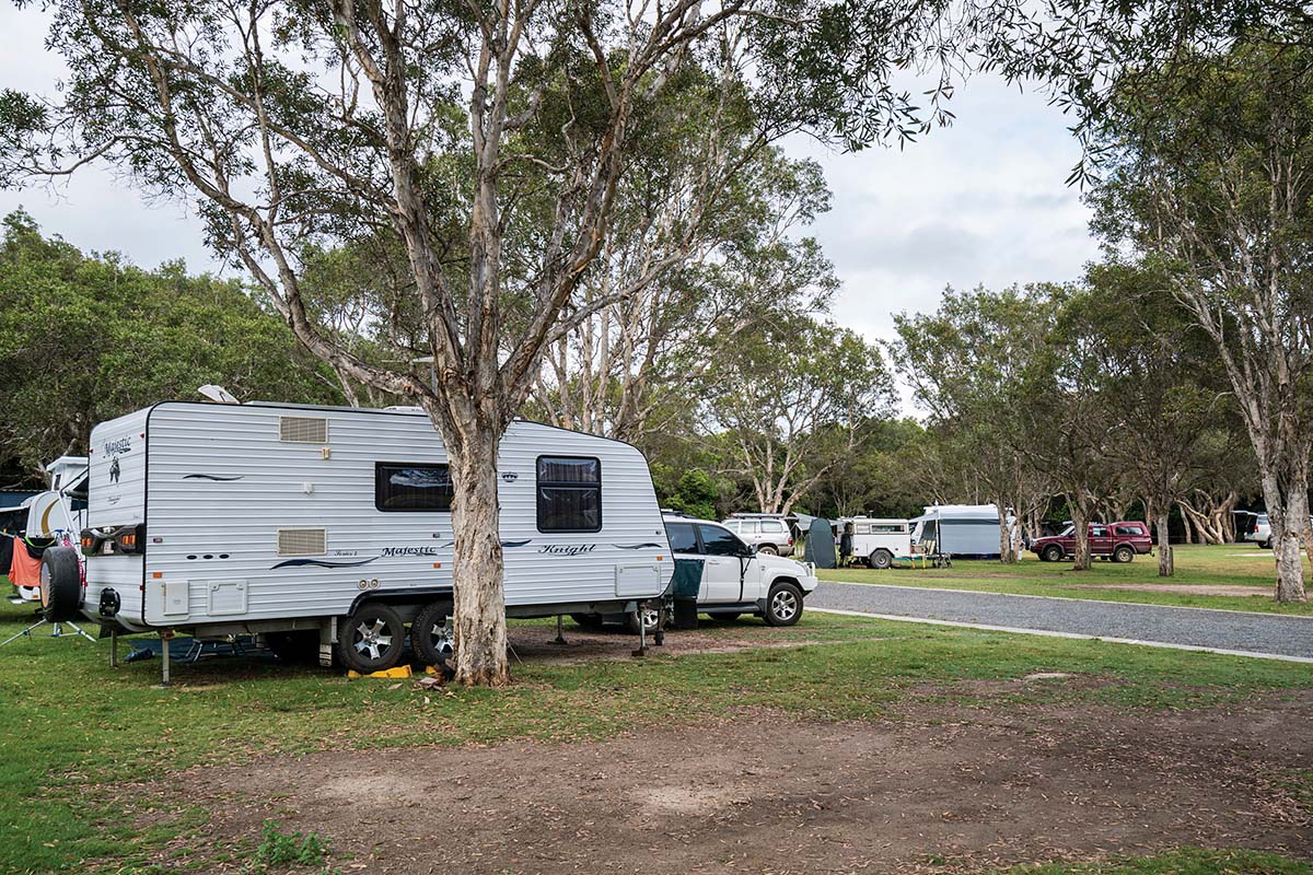 Caravans at Diamond Head Campground, at Crowdy Bay National Park. Crowdy Head near Taree, NSW. Credit: NSW Department of Planning and Environment / Jaime Plaza Van Roon