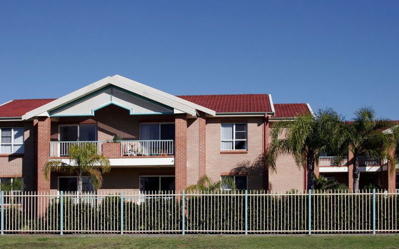 Looking at the front of double story brick house