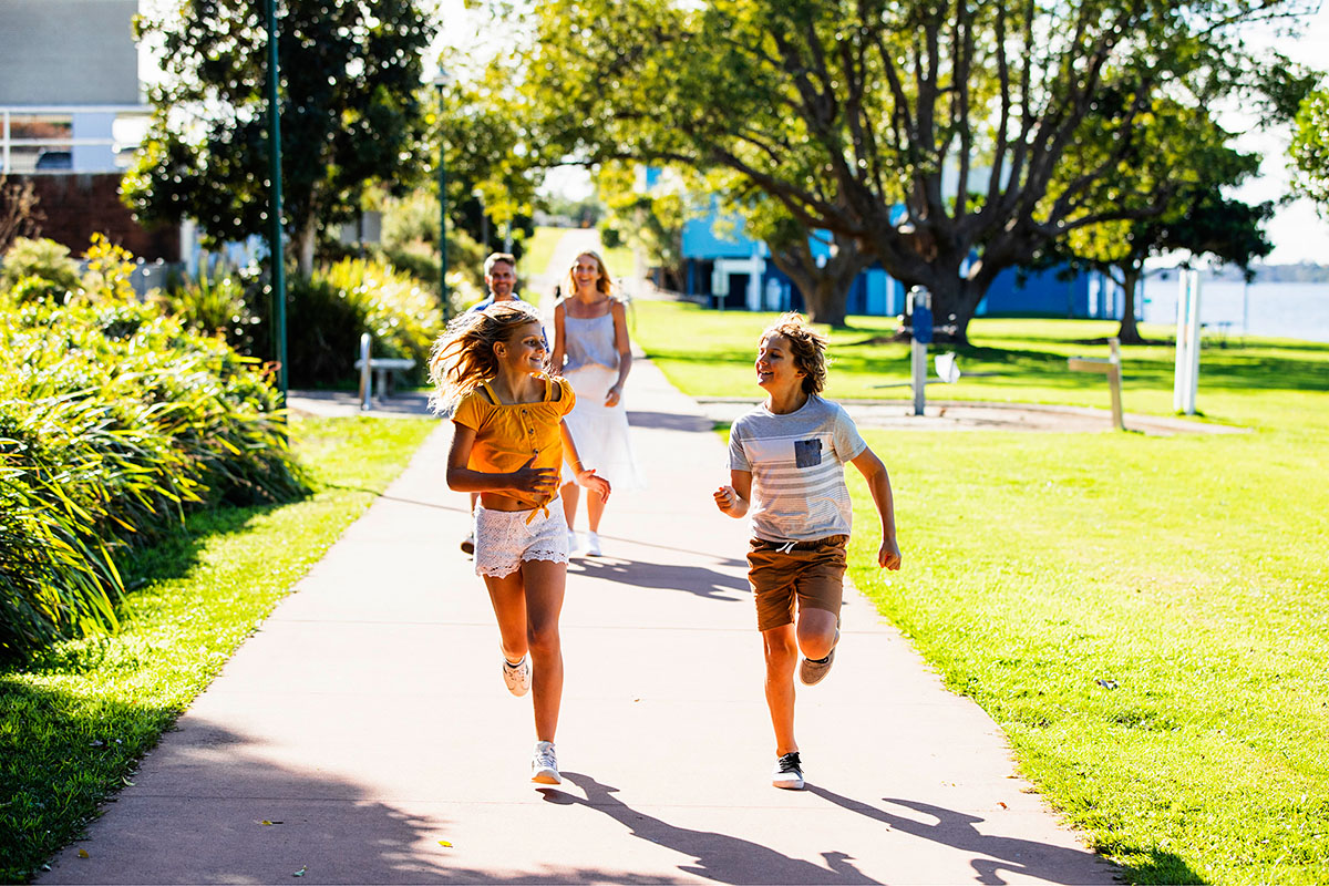 Family enjoying a self-guided walk along the Taree Heritage Walk, Taree. Credit: Destination NSW