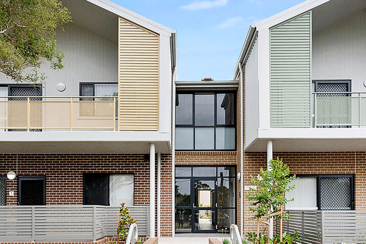 Newly constructed low-rise social housing.