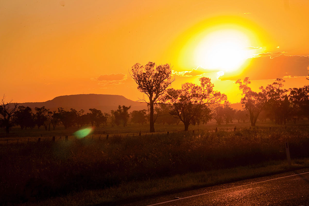 Oxley Highway at sunset. Liverpool Plains, NSW. Credit: NSW Department of Planning and Environment / Neil Fenelon