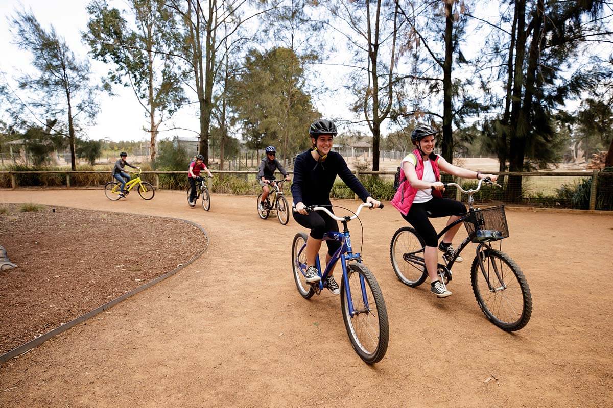 Small group enjoying a cycle around Taronga Western Plains Zoo, Dubbo.