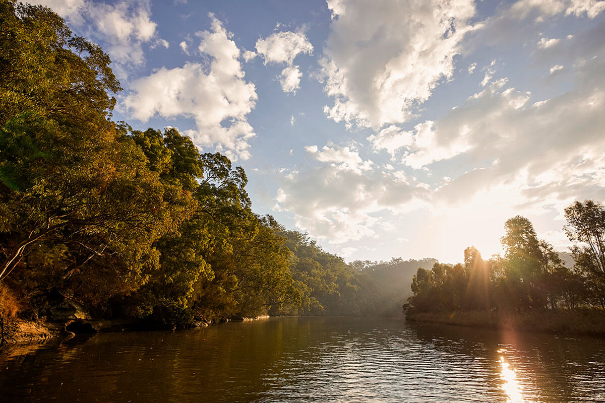 Sun setting over the Hawkesbury River, Wisemans Ferry. Credit: Destination NSW